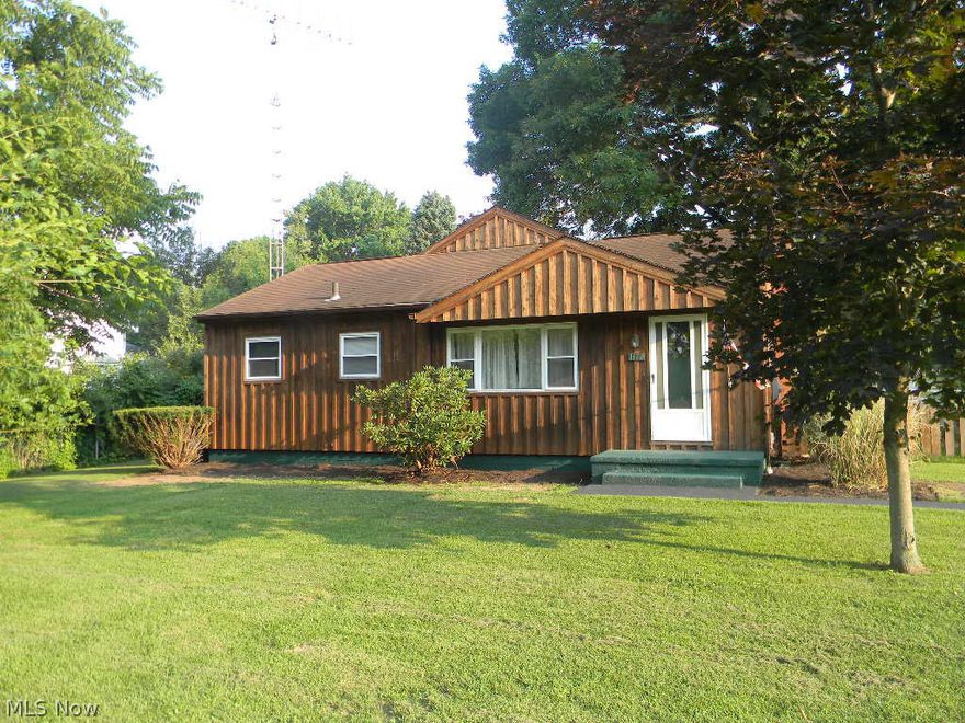 4 Bedroom Ranch on approximate 1.3 acres, features a 50'x 28' 3 bay garage. One bay utilized as work shop with heat, air, and 100amp service. Home features a spacious living room with wood burner stove, and slider to deck, a spacious kitchen with appliances and loads of storage space, sun room currently used with a heated spa (neg), basement very dry with a laundry area and unfinished family area, the crawl space is lighted with concrete floors, great for storage. Located Close to shopping and I-77