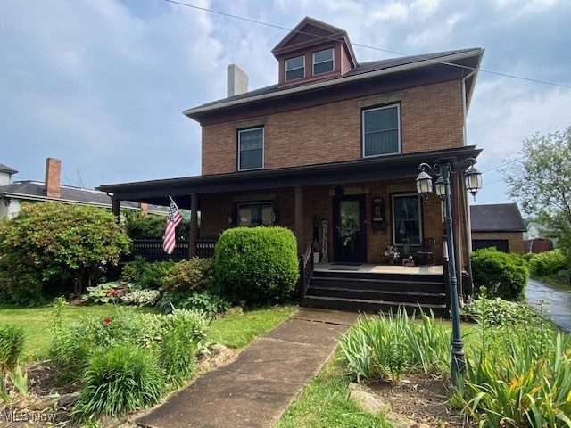 Step into this beautifully maintained 3 bedroom brick home, built at the turn of the century that is full of character. Featuring stunning refinished original woodwork, this property blends historic charm with modern comforts. Enjoy meals in the formal dining room or the spacious eat in kitchen, perfect for large gatherings. The home is surrounded by exquisite landscaping, offering great curb appeal and a serene outdoor retreat. Additional highlights include a large two car garage and plenty of living space throughout.