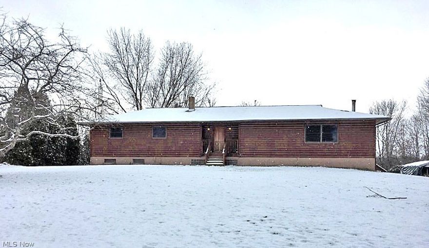 Beautiful and unique ranch home. Has log siding and nice size yard. Open concept living area with a soap stone wood burner. home has hardwood flooring throughout the house. Kitchen has beautiful wood cabinets, stainless steel appliances, stainless steel apron front sink. Nice master bedroom with 2 ceder lined walk in closets. A walk out basement with endless possibilities. A must see home.