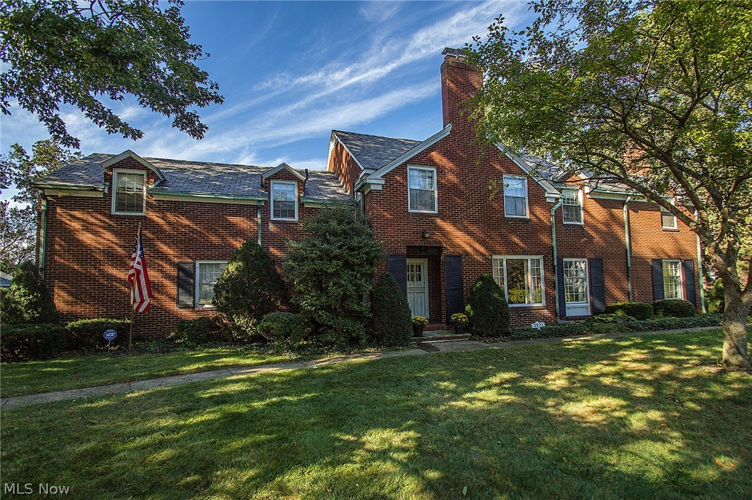 Stately, all brick two story! Almost 3/4 of an acre and over 130' of Lake Erie water front right out your back door! Breakwall consists of stone boulders, steel pilings and footers anchored in bedrock! Most of the original attributes of home preserved! Original slate roof! Gorgeous hardwood flooring protected by carpeting for many years! Spacious living room with marble fireplace! Comfortable formal dining room! Eat-in kitchen with Amish cherry cabinets and ceramic tile floor! Nice family room with large picture window offers amazing views of the lake! Cozy library with additional fireplace! Second floor offers a huge master bedroom, four additional bedrooms and three full baths! Walk up attic includes a cedar closet! Finished basement with third fireplace and half bath! Beautiful yard with mature trees and soft slope to the lake with potential for access! The possibilities are endless! This is an unbelievable opportunity to be on Lake Erie in an incredible home for les