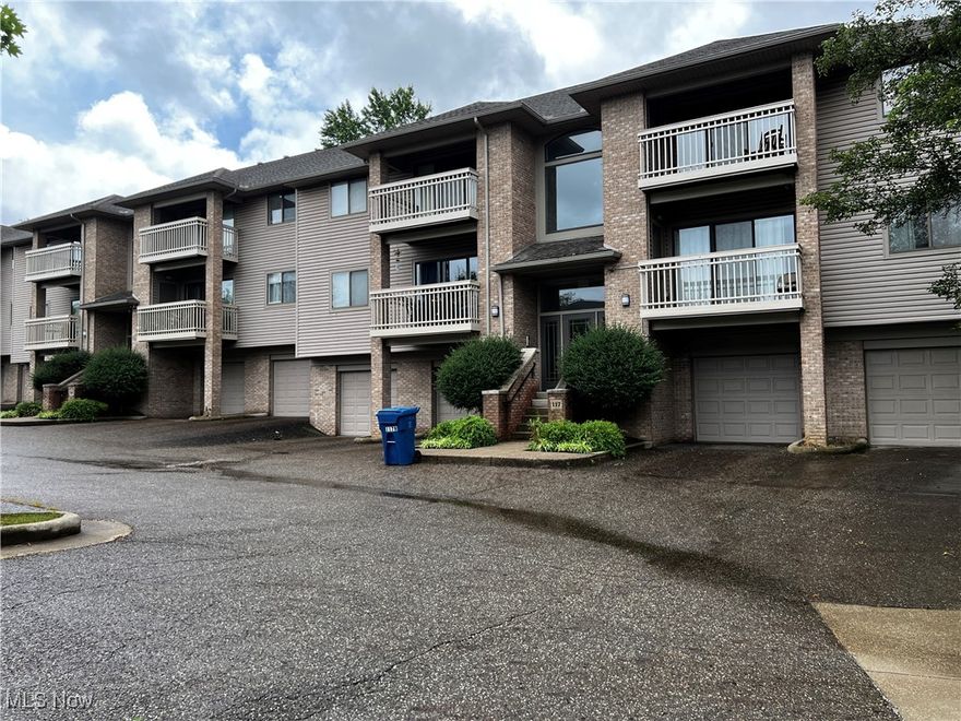 Beautiful, Well Maintained 2 bedroom, 2 full bath condo in a secure building.  Spacious great room/dining room with a vaulted ceiling, lots of natural light and 2 balconies.  The balcony on the front overlooks the neighborhood and the balcony on the back features  a quiet wooded view and is a place to relax and enjoy the shade trees.  
This condo features brand new carpet, fresh paint, updated stainless appliances, pantry closet and an eat-in kitchen with access to the back deck which overlooks the beautiful green space.  
The primary suite has a walk in closet, owner's bath with walk in shower, ceramic tile floors, updatd lighting and fixtures.  The main bath has a tub/shower combination, ceramic tile floor, updated lighting and fixutres too. The Central Air and hot water tank were updated in 2020.  The condo also features a convenient laundry room with stackable washer/dryer which is locate just off the kitchen.  
The condo comes with a 1 car garage space and opener and a large storage closet.  Additional abundant parking is available for owners and visitors.  
The Enclave development provides a quiet, private seetting withh easy access to I-77, Rt. 18 and a variety of restaurants and shopping.  The Enclave also has a Clubhouse which is located in the front of the development and features a variety of amenities, including a fireplace,  restrooms, an exercise room, sauna and and Community room with a smalll kitchen that can be booked for events.  
Outside of the clubhouse amenities include a patio with table and seating, firepit and grill which is perfect for gathering with neighbors and/or friends.  The condo is a perfect blend of style, comfort and functionality. Dont' forget to check out the largestorage closet in the garage which locks for added security.