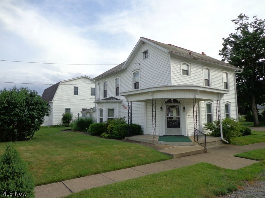 Beautiful 2 story home in downtown Dresden. Updates include vinyl siding, windows, furnace. Just needs your personal touches to be a remarkable home. Lots of square footage in this house. 5 car detached garage would be a great place to run your own business out of or for that family that has lots of toys. Call today this one will not last...