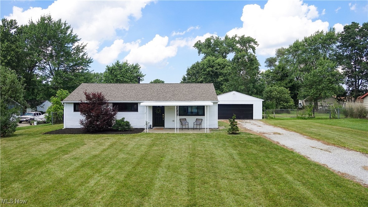 This home had a total home makeover in 2020. New flooring, custom designed kitchen with newer stainless appliances. 2020 HVAC system and bathroom. The owner just added a stunning feature wall and had the exterior of the home and 2 car garage professionally painted. The large back yard is fully fenced and has raised bed gardens. This home is cute as a button and ready for a new owner.