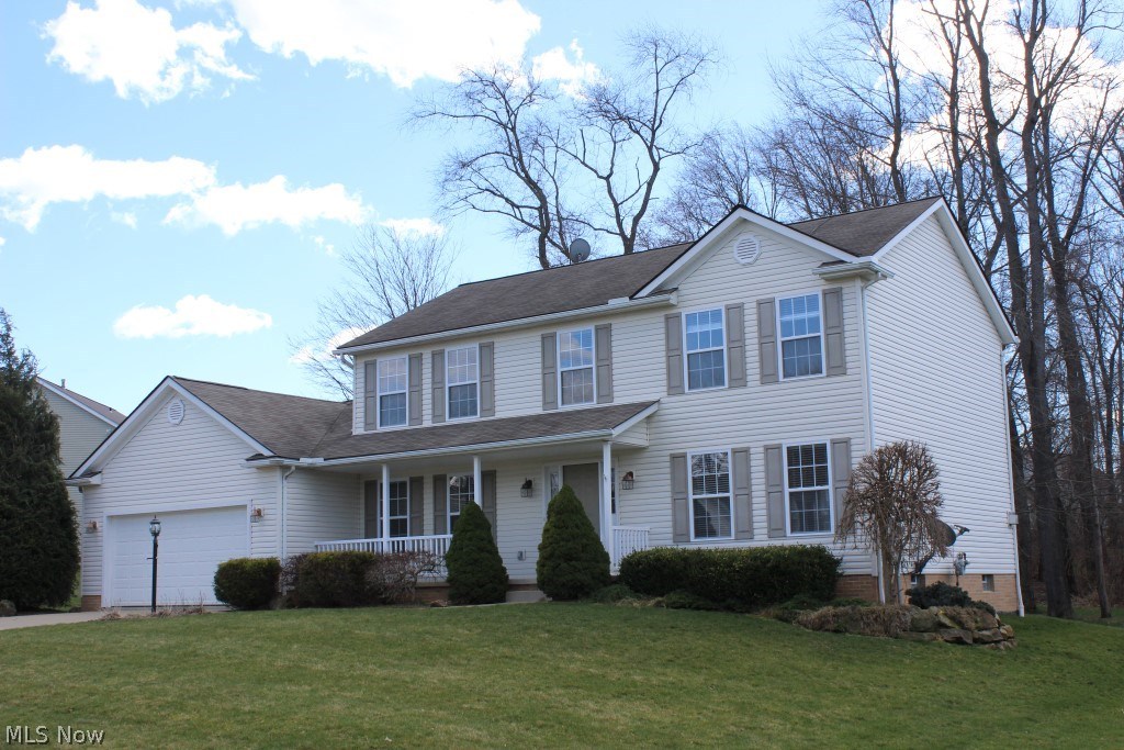 Wonderful 4 bedroom, 2.5 bath colonial in City of Green open & spacious with neutral décor & 2548SF* Foyer with oak floor & chair rail* Living room with crown molding* Formal dining with chair rail & crown molding* Family room with corner gas log fireplace & fan* Spacious kitchen & breakfast room having oak cabinets with crown molding, island, desk, walk in pantry & slider to deck* 1st floor laundry with laundry tub, cupboards & includes washer & dryer* 1st floor office* Double door entry to master with fan, walk in closet & master bath with double vanity, garden tub & shower* 3 additional bedrooms & guest bath with double vanity complete the 1st floor* 12 course basement ready to be finished, plumbed for full bath & glass block windows* Other features include 6 panel Masonite doors, plantation blinds, generous 2 car attached garage with hot & cold water & service door, plus radon mitigation system* Just move in!