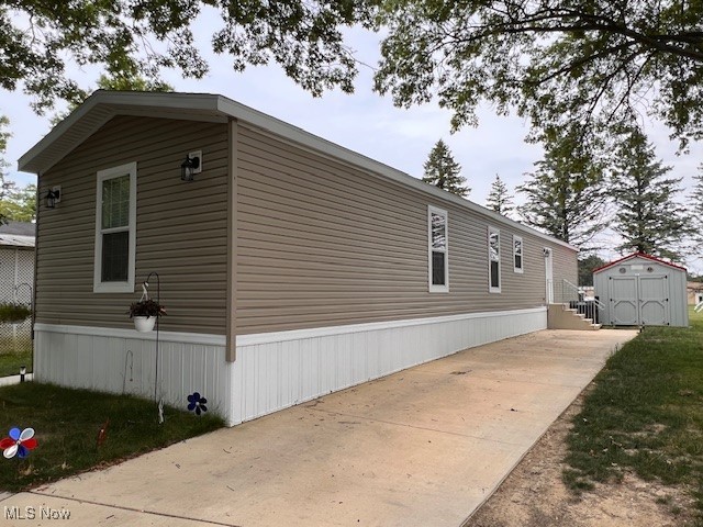 Welcome to this beautiful 2024 Redman Advantage II manufactured home in Silverstone Lake Estates! This lot overlooks the lake and has a larger backyard space complete with a new 10x10 shed. The home has 3 bedrooms and 2 full bathrooms and an open concept living room and eat-in kitchen. The kitchen is spacious and bright with a large island and comes with all the appliances, even the washer and dryer in the separate laundry room stay! Everything is practically brand new, so you can move right in!
