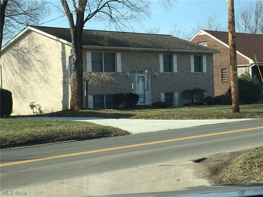 NEWER BRICK SPLIT ENTRY LOCATED ON LOVERS LANE WITH EXTENDED PAVED DRIVEWAY AND SIDEWALK. CLOSE TO PRIME TIME, MALL, WALMART, ETC..
OVER 1700 SQ FT LIVING AREA,WITH WALK OUT GROUND LEVEL TO PARTIALLY FENDED BACK YARD,CATHEDRAL CEILINGS IN LIVING ROOM, MASTER BATHROOM WITH SHOWER, SLIDING DOORS IN DINING AREA TO DECK, SOME NEWER APPLIANCES, ALL CERAMIC FLOORS ARE NEWER.
 RECROOM , LAUNDRY ROOM AND 1/2 BATH ARE LOCATED ON GROUND LEVEL. CALL OFFICE TO VIEW.