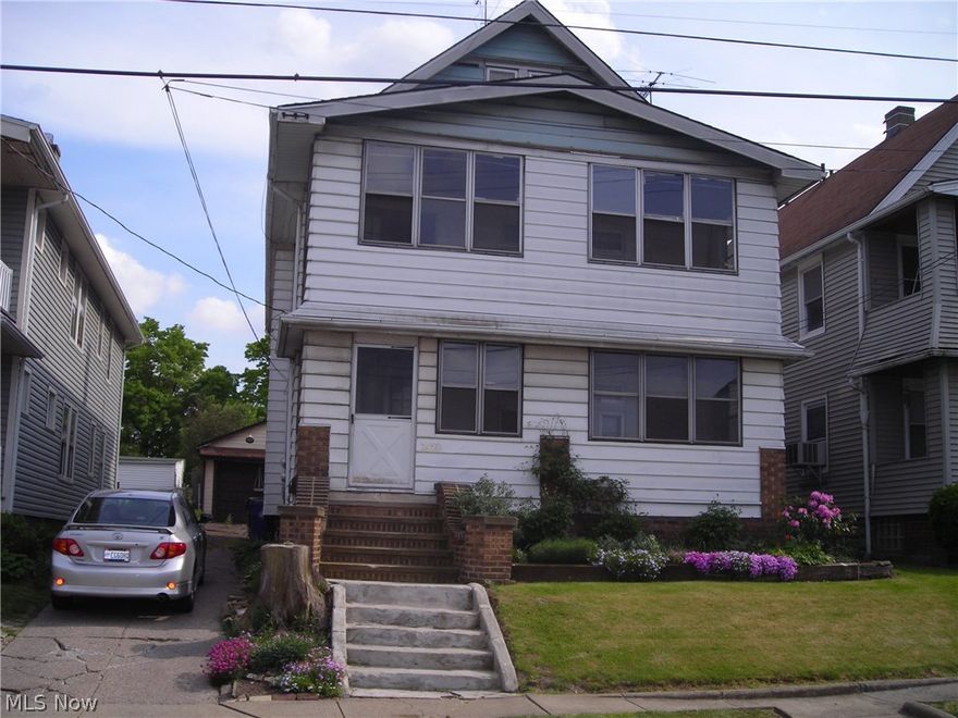 Great Investment! Large 2-Family house w/all natural woodwork, pillars, corner cabinets & bench seats in both units. Classic style for Old Brooklyn. Upstairs furnace less than 1 yr. old. All hardwood floors upstairs, carpet down. Relaxing enclosed front porches on both units.