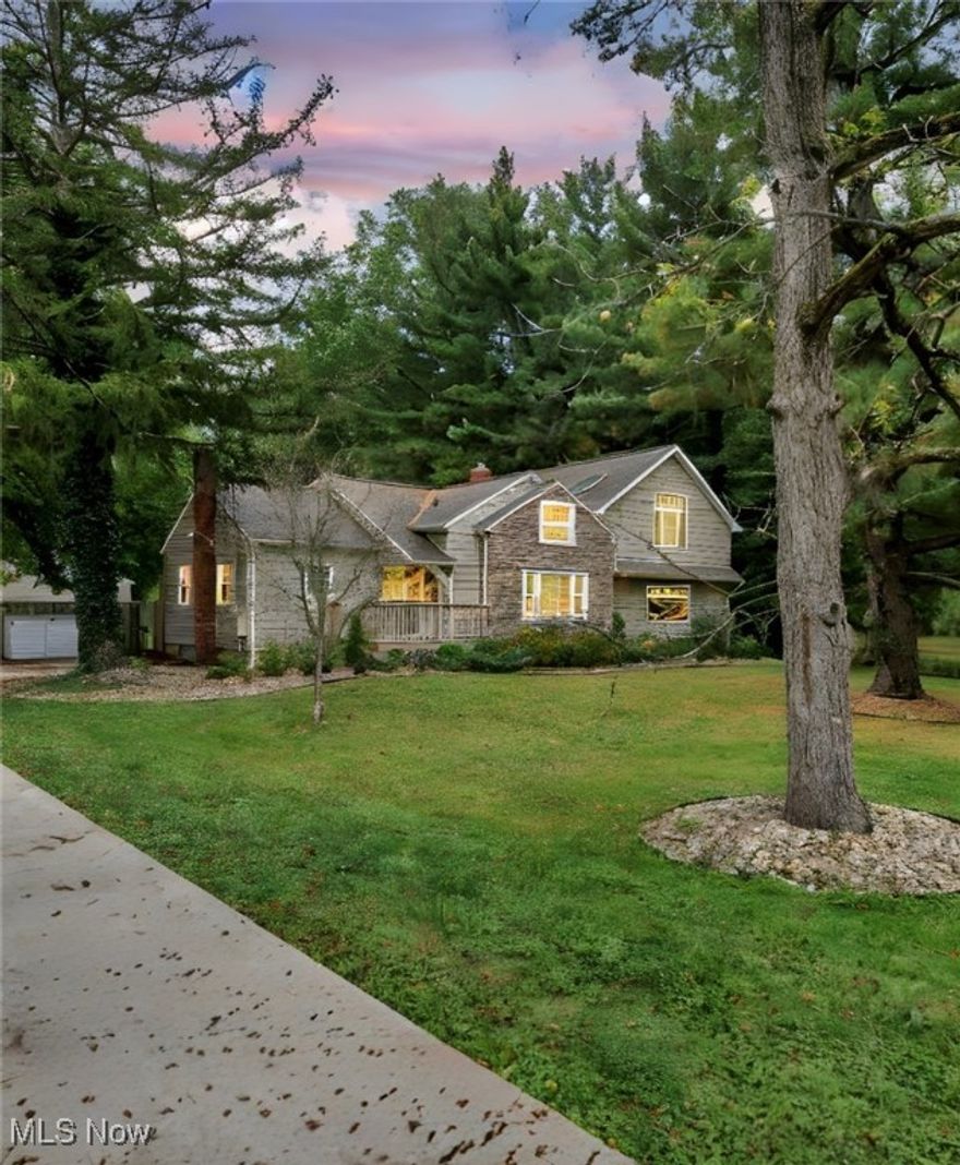 NEW PRICE & READY TO MOVE!

Spacious and full of charm, this 3-bedroom, 3-bath modern Cape Cod offers nearly 3,000 sq. ft. of beautifully updated living space on a private 1.26-acre lot in Macedonia.

You’ll fall in love with the bonus outbuilding — a heated and air-conditioned space with a fully finished loft, half bath, and dedicated painting room with exhaust fan. Perfect for a home office, studio, or guest suite!

Inside, the updated eat-in kitchen shines with slate flooring, granite countertops, and stainless-steel appliances. Host formal dinners in the dining room by the cozy gas fireplace, or enjoy casual mornings in your private primary suite balcony.

The primary suite also features a built-in desk, walk-in closet, and spa-like bath with a jetted tub. The lower level includes Nature Stone flooring, a laundry chute, and plenty of extra space.

Step outside to a large deck and patio for entertaining or quiet relaxation surrounded by trees.

Conveniently located near the YMCA, Macedonia Rec Center, shopping, dining, and quick highway access — this property blends peace, practicality, and personality.

Seller is motivated and ready to close quickly — don’t miss your chance!