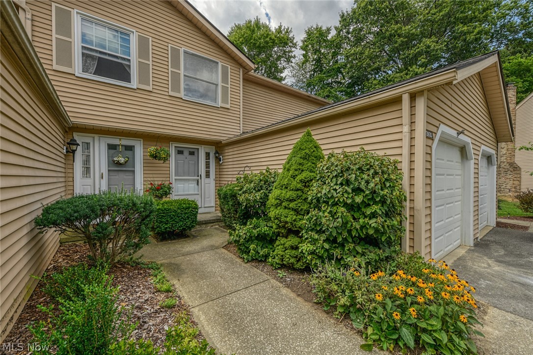 3930 Lake Run Blvd, Stow, OH 44224 welcomes you as a fully remodeled condominium in the highly sought after Woodland Lake Condominiums features 2 bedrooms w/ 1 full bathroom & 2 half baths, so there's a bathroom on all 3 floors! Don't miss out, this condo should be on a MAGAZINE! Single car garage w/ newer door w/ opener protects your car from the cold & hot weather, no more scraping nor no more burned bums! Beautifully remodeled kitchen w/ new white flat panel cabinetry, easy close systems & dual reach cabinetry over the breakfast bar for awesome use of space offering great storage! The gorgeous granite was just installed, w/ seating/eating bar from Living Room side can easily seat 4 adults! Also just installed are the new stainless steel appliances (refrigerator, gas stove, over range microwave, dishwasher) & stainless steel kitchen sink & faucet w/ sprayer. The flooring has been replaced throughout with a wood look plank flooring along with the new carpeting in the Finished Lower Le