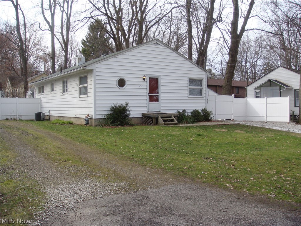 3-bed; 1-bath ranch home with full basement located in Kent! Quaint and charming with lots of functionality! Perfect as an investment property or your primary residence. Spacious eat-in kitchen offers lots of room to cook while you entertain friends and family. Create many lasting memories in the cozy and inviting living room adorned with hardwood flooring. Nice-sized bedrooms located conveniently near the living area also boast hardwood floors. Full; unfinished basement provides extra storage or the opportunity to create your own additional living space. Lots of closet space throughout the main level. The private, fenced-in back yard has lush, green ground cover; a darling stone walkway; and a small brick patio. This is the perfect spot to relax and rejuvenate. The 12 x 10 ft. shed has GFI protected electrical service (150 amp) and is divided into two separate storage areas with access from both ends. Located on a quiet and peaceful cul-de-sac street. Just minutes from loc