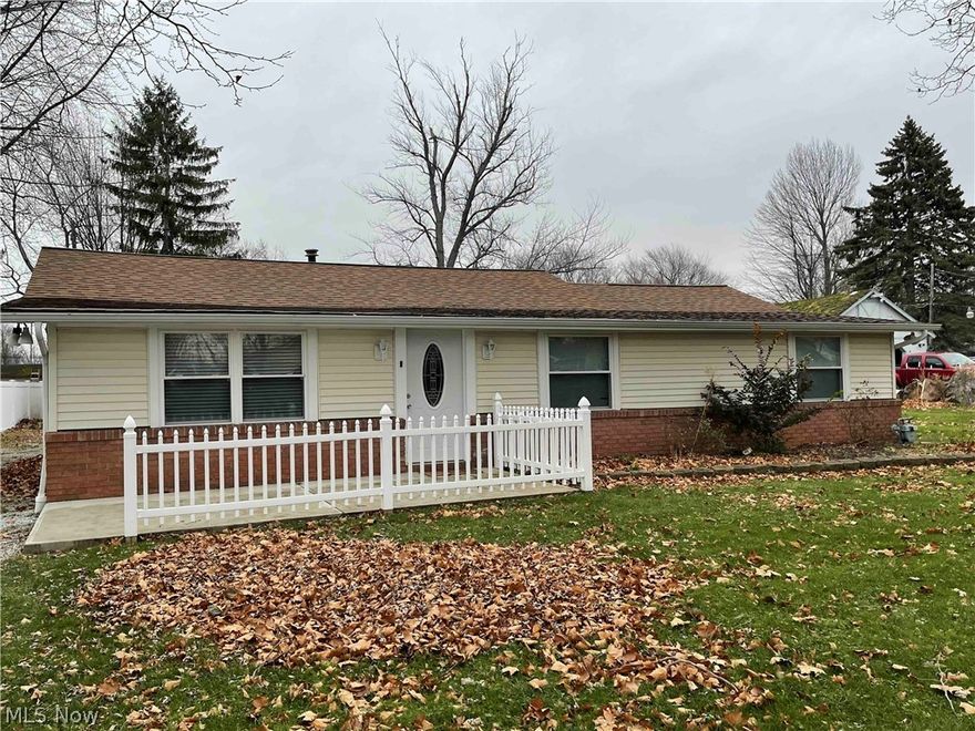 Newly updated ranch home near Lake Erie with a front porch and rear deck.  New Furnace 2019, Flooring 2019, Hot Water Tank 2019, New roof 2019, New Windows 2019, handicapped accessible walk in shower in master bathroom and both bathrooms are updated. The living room is large and has a beautiful brick surround with a gas burning fire place with a wood burning stove. Bright brand new eat in kitchen with a slider to the back deck also includes newer stainless steel appliances and enough room for a large dining room table or island. Large master bedroom with attached master bath is perfect for your king size bed and just about anything else you would want.