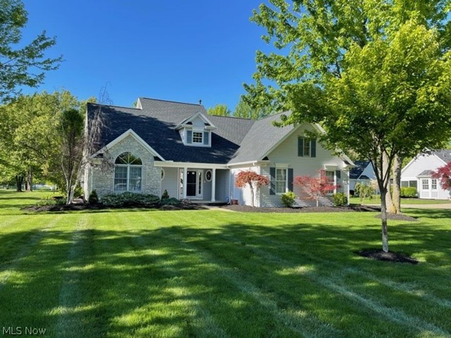 Well appointed Cluster Home located in desirable Windmill Village. New Roof Nov. 2019. Updated with high end finishes and a 1st floor Master Bedroom. Kitchen remodel includes a 6 burner Wolf range with upgraded built in hood vent; Biscoti KraftMaid custom cabinetry w/cocoa glaze, soft close doors and drawers, cabinet lighting, granite countertops, stainless steel refrigerator. Solid 3/4" Oak flooring in kitchen, dining area, halls and foyer; oil rubbed bronze hardware installed on interior doors. First floor half bath has Italian marble flooring, custom vanity w granite top and accented w wainscoting. The 2 story Great Room is open and bright with lots of natural light and a ceiling fan with lights. Master Bath has been updated w custom engineered wide plank wood flooring, furniture piece double bowl vanity with marble top and wall mounted faucets. Beautifully tiled shower w glass sliding door. All first and second floor baseboard molding has been replaced with 5 1/2" tall solid wood t