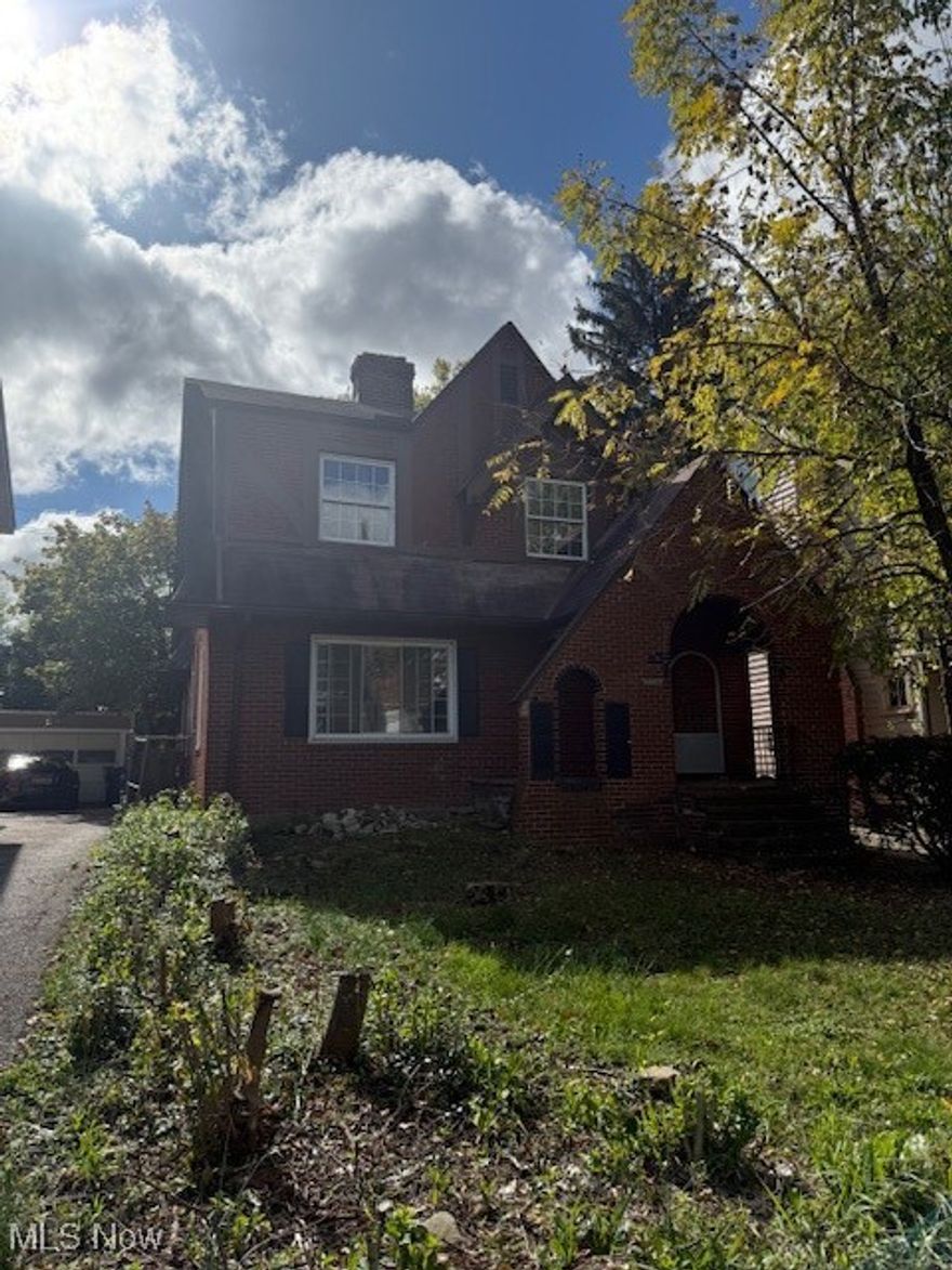 Investor special!  FIXER in Cleveland Heights!  4 bedrooms, large living room, 2-car detached garage, and plenty of potential!