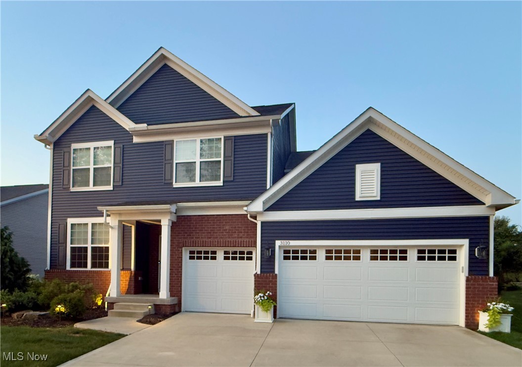 Only 5 years old, this beautifully designed Pulte home blends modern living with a warm, welcoming style. The oversized foyer opens to a flex room with French doors, ideal for a home office, library, or playroom, plus a convenient half bath. The open great room features soaring ceilings, in-ceiling Sonos speakers, and a cozy gas fireplace overlooking the dining area and stunning kitchen. Here you'll find upgraded cabinetry, quartz counters, a large center island with breakfast bar, stainless steel appliances including gas cooktop and wall convection oven/microwave, and a walk-in pantry. A spacious mudroom with built-in boot bench and walk-in closet keeps life organized.
Just off the first-floor stair landing is a unique planning nook perfect for a small office, homework station, or household command center. Upstairs, a large loft provides flexible living space, while the serene owner's suite boasts a huge walk-in closet and spa-style bath with oversized walk-in shower and private water closet. Three additional bedrooms each feature their own walk-in closet, plus the laundry room (washer and dryer remain) adds everyday convenience.
The unfinished basement with half-bath rough-in is ready to finish, while the 3-car garage offers plenty of parking and storage. Enjoy a private backyard and thoughtful upgrades including LVT flooring, trim package, and tankless hot water heater. Located near Liberty Park and just minutes to shopping and dining, this home combines style, comfort, and convenience in one exceptional package.