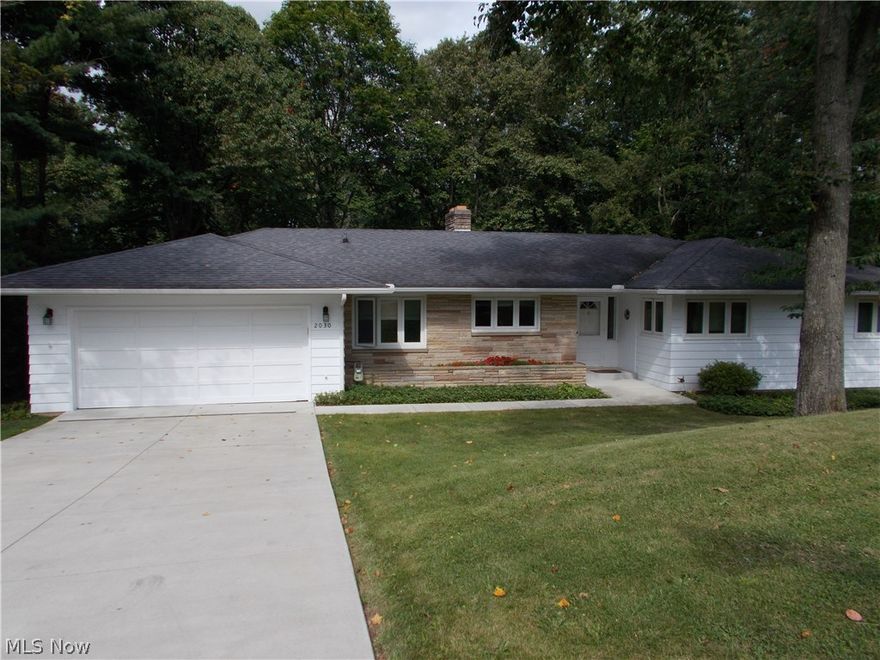 This is a beautiful 4 bedroom home with 2 fireplaces, large living room with a great view, finished basement with family room, bedroom, full bath, fireplace, and extra storage rooms. There have been many recent updates to this home that offers over 3000 square feet . Call to view this home today !!