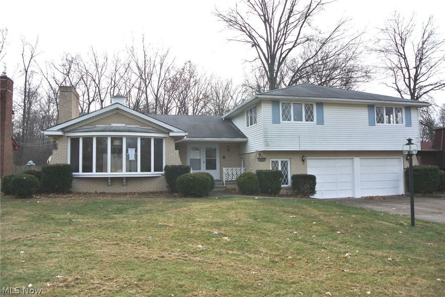 Welcome home to 935 Red Hill Drive! This spacious 4 bedroom home with custom features that will impress you from the moment you step inside. Picturesque windows with wood-burning fireplace in living room. Nice sized dining room. Large kitchen offers eat-in area, lots of cabinet space, built in appliances, ceramic tile flooring, plus sliding glass doors that lead you to your beautiful, partially wooded backyard. Family room with wood burner insert (fireplace) along with wall of patio doors that lead out to private patio area. Master bedroom is unique with abundant closet area, private bath, balcony. Wood flooring in most rooms. Each room has its own thermostat to control heat, making this very energy efficient. Unfinished basement. Oversized 2 car garage offers plenty of storage.  HUD #412-795454. Property is being sold "as-is". This home is FHA IE - Repair Escrow.(Insurability Subject to Buyer's Appraisal). Pre-Approval or Proof of Funds are required.  Buyer is responsible for all due