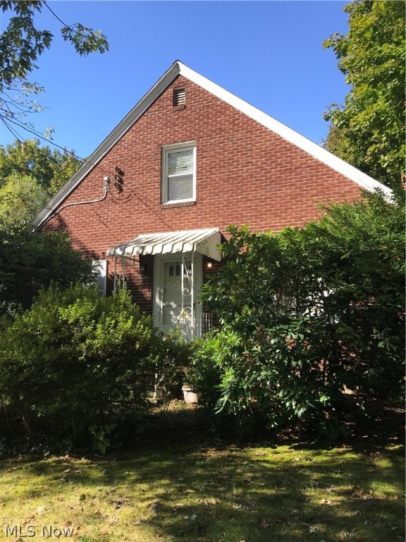 What a great opportunity to own a home and live where you feel you are in the country. On almost an acre with with trees and privacy! All brick home with 3 bedrooms, 2 baths, and enclosed back porch. Newer updates include Roof and Gutters 10/2017, Plumbing work within last 5 years, New furnace in 2012, and there is central air. 2 Car Garage with new doors. Some windows have been replace throughout the house. There is a large eat in kitchen, plus a dining area that is separate! Living room has a wood burning fireplace and plenty of room for entertainment. There are hardwood floors under carpet throughout the house! You will love the charm of this home and it boosts many possibilities to fix up and make it your own. Home is being sold as is.