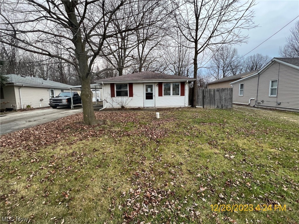 Two bedroom with car port, large shed, in a far west side Lorain location.
