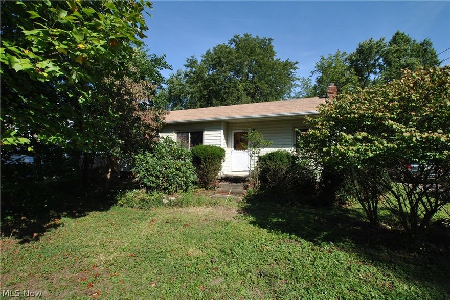 3 bedroom ranch with basement. Prime Location! Sits on 2.15 acres with wooded views. Lot size is 82 ft x 1,142 ft. 2-car detached garage. Great school system. A must see!