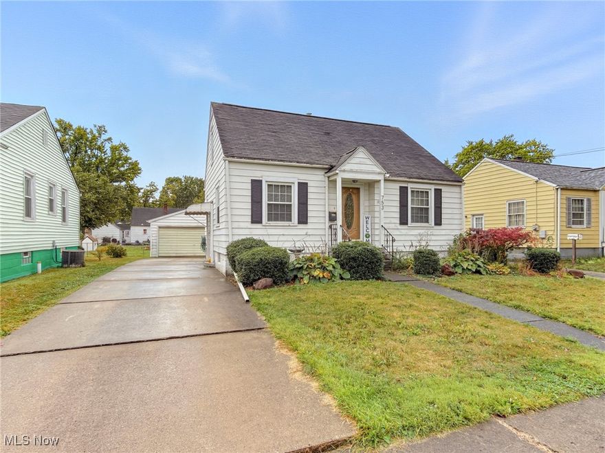 Move-in ready Cape Cod home in an established Warren neighborhood. Abundance of natural light throughout with bright neutral color palette. Living room with adjacent flex space - perfect for dining, home office, or playroom. Galley kitchen features oak cabinets, tile backsplash, stainless steel appliances, Ceramic tile flooring with sliding doors to the deck. Main floor bedroom provides convenient access to the full bath. Upstairs, a huge second bedroom with additional closet space. Full unfinished basement. Large deck overlooks the partially fenced backyard. Oversized two car detached garage. Concrete driveway provides parking. Close proximity to Packard Music Hall,  Amphitheater, and Downtown Warren. Easy highway access for commuting, and to the Eastwood Mall complex. One Year Home Warranty provided for buyer - ask your agent for details.Brand NEW central air (Sept. 2025), Vinyl Windows, Stainless Steel Appliances, and more. Schedule a tour today!