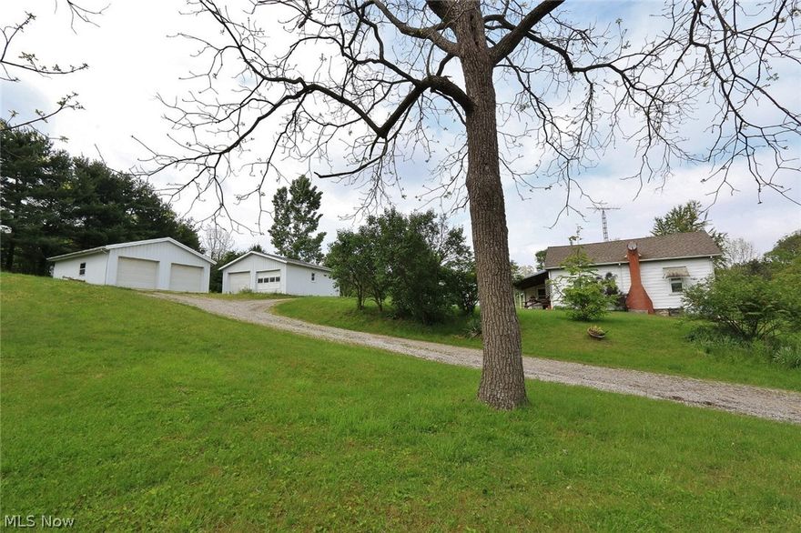 A little more than three acres for you to build your dream home. There are two garages with electric openers . There is a dug well with enough water for this family. The house is a little rough and it would take some work to get it up to todays standards. There is no septic system. The owner will be selling as is with no repairs. List price is far below auditors value.