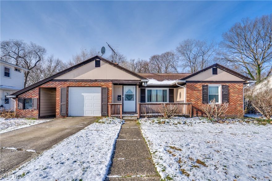 Welcome home to this charming 3-bedroom, 2-bath ranch in the heart of West Akron, directly across from Schneider Park and just minutes from schools, highways, and amenities. Inside, you'll find original hardwood floors throughout the main level. The living room features a wood-burning fireplace to keep you warm during those chilly winter nights. The kitchen includes stainless steel appliances that stay, laminate countertops, and laminate flooring. Off the kitchen is the dining room that opens to a spacious family room addition. All three bedrooms offer hardwood flooring and double closets. Completing the main floor is the full bath with a single vanity and a tub shower combo. The partially finished full basement expands your living space by 936 square feet and includes a huge rec room, a built-in bar with sink, and a bonus room painted with movie-theater projection paint, perfect for a home theater, office space, or storage. There is a beautifully updated full bathroom (2024) with a glass-enclosed shower and a linen closet. Lastly, you'll find a laundry area complete with a washer and dryer. Outside, enjoy a one-car attached garage with a new 2024 garage door, and enjoy your mornings with a cup of coffee on the front deck. Additional updates include HVAC 2023 and an updated electrical panel. Don't miss your chance to see this beautiful home; schedule your showing today!