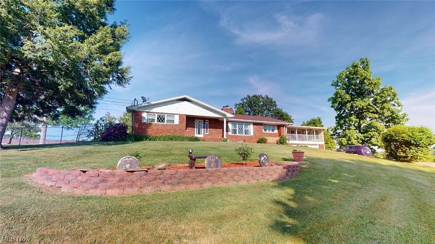 ***BACK ON MARKET AT NO FAULT OF SELLER***  Meticulously maintained move in ready home sitting on 1.5 acres in the heart of South Parkersburg.  Walk up the flagstone sidewalk into the front door and admire the gorgeous wood floors, the large rooms and the abundance of natural light.  The living room offers a wood burning fireplace but you will be spending much of the summer on the newer deck or in the sunroom complete with ceiling fans from the vaulted ceilings.  The eat-in kitchen counters and flooring have been recently upgraded and the cabinets are soft close with lots of extra pull outs.

The basement offers a large recreation room, laundry room, full bathroom and lots of storage.  

The 1.5 acres offers privacy with a view, fruit trees, berry bushes and lovely landscaping.