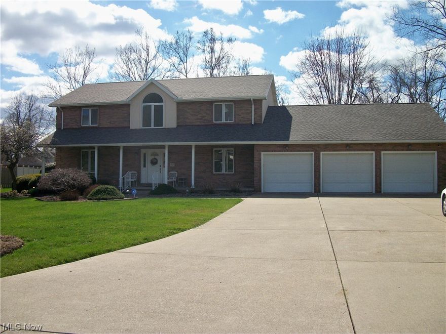 NESTLED IN THE HEART OF MEADOWBROOK ACRES IN BELPRE, Welcome to this 2600+sq.ft. 2 story brick/stucco home sitting on a dead-end St. just a short distance from the hustle & bustle of necessary amenities. White handrails lead to an inviting front porch & front entry door. Step into a spacious foyer leading to a formal living room with Pella windows with sun shutter shades & a formal dining room. A short hallway leads to an eat-in kitchen, stovetop island, abundance of cabinet space, large corner built-in hutch & large pantry for lots of storage. Appliances include range, refrigerator, garbage disposal & dishwasher. Off the kitchen, for seamless entertainment is a large family room & through the French doors, an all season  sunroom with lots of natural light & views of a landscaped back yard & Paver patio. Convenient 1st floor laundry, 1/2 bath & office/library with equipment for surround sound thru-out home & whole house vacuum system. Upstairs is a versatile area perfect for office/sit