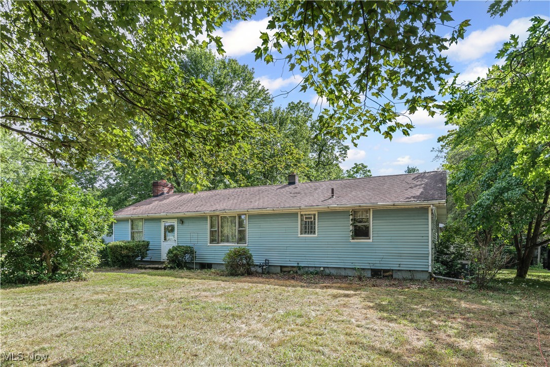Enjoy the perfect blend of privacy and convenience with this charming ranch located just minutes from all local amenities. Situated on a spacious .76-acre lot in Lexington Township within Marlington Local Schools, this property offers room to grow both inside and out. The main floor features three bedrooms and one and a half baths, providing comfortable single-level living. A walkout basement adds potential for extra living space or storage. Outside, you’ll find a three-car detached garage and a barn with a loft—ideal for hobbies, storage, or a workshop. While the home could use some TLC, it offers great potential and is ready for immediate occupancy—just in time for the holidays! Come see the possibilities this property has to offer and make it your own!
