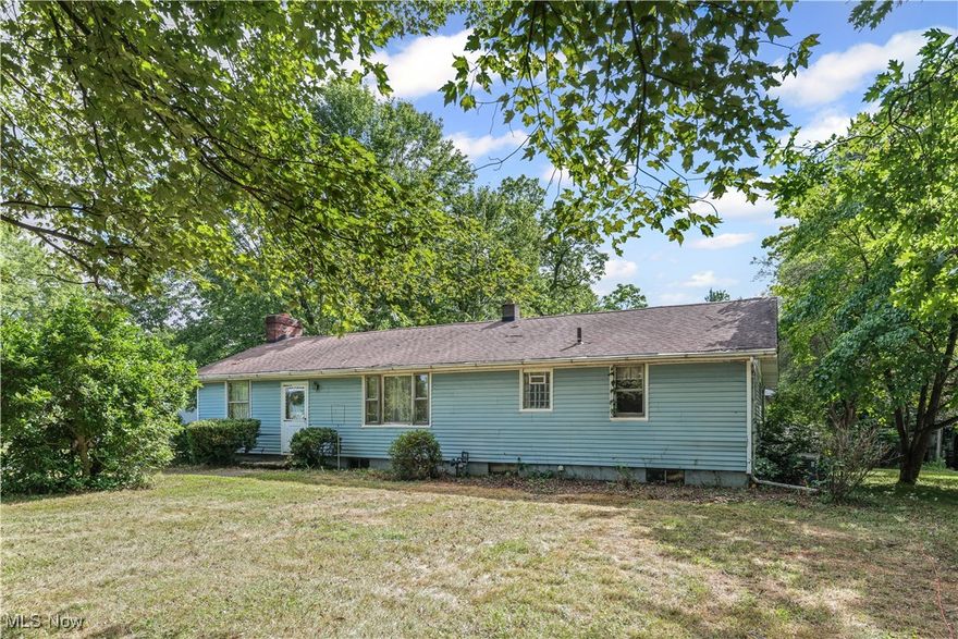 Enjoy the perfect blend of privacy and convenience with this charming ranch located just minutes from all local amenities. Situated on a spacious .76-acre lot in Lexington Township within Marlington Local Schools, this property offers room to grow both inside and out. The main floor features three bedrooms and one and a half baths, providing comfortable single-level living. A walkout basement adds potential for extra living space or storage. Outside, you’ll find a three-car detached garage and a barn with a loft—ideal for hobbies, storage, or a workshop. While the home could use some TLC, it offers great potential and is ready for immediate occupancy—just in time for the holidays! Come see the possibilities this property has to offer and make it your own!