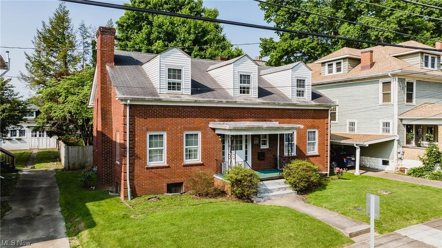 This 4 bed, 2 bath home is located in the heart of Parkersburg, WV. It is a short drive to shopping, dining, and entertainment. The home is solid with good bones. The home features hardwood floors, walkout dry basement, newer high efficiency furnace, updated electric panel to 200 amp, large shady back yard, large private covered back porch, large eat in kitchen, dininig room, large living room with gas logs, and a front room that would be perfect for use as an office or a forth bedrrom There is a large family room in the dry basement. Lots of extra storage in the basement and thru out the house. The backyard is full of all kinds of preanials, iris, pionies, hostas and probably others. In addition there is an extra storage buiding and a nice chain link fence in place.  The home needs a new owner and some TLC and would be a good canidate for a refurbish 203K loan.