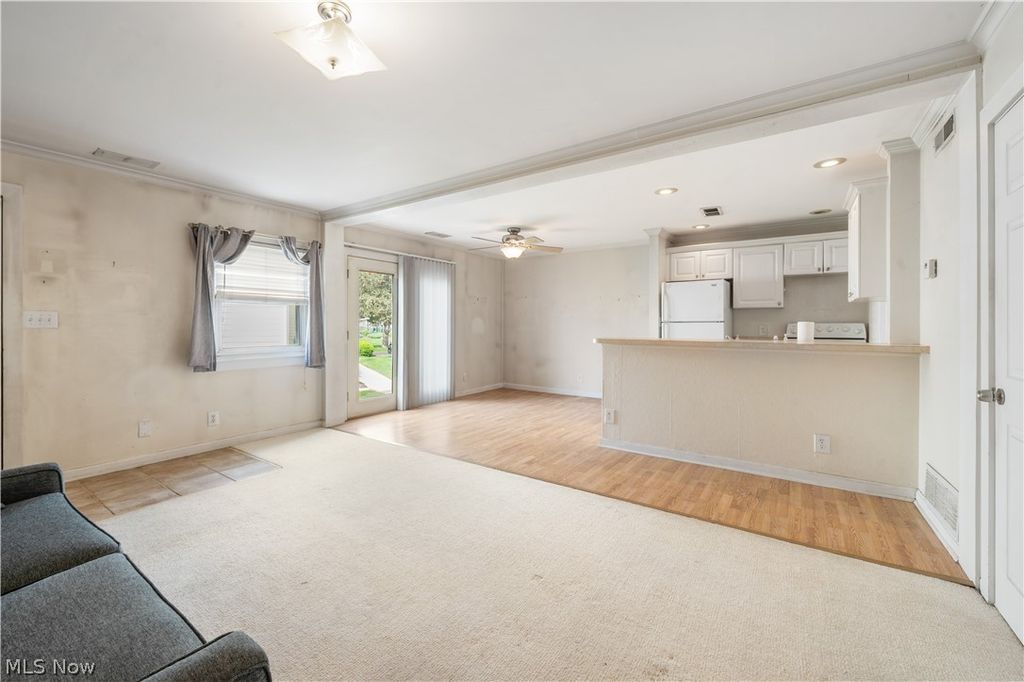 Photo of 2535 Royal County Down Dr #B, Uniontown, OH 44685 (MLS # 5195401)