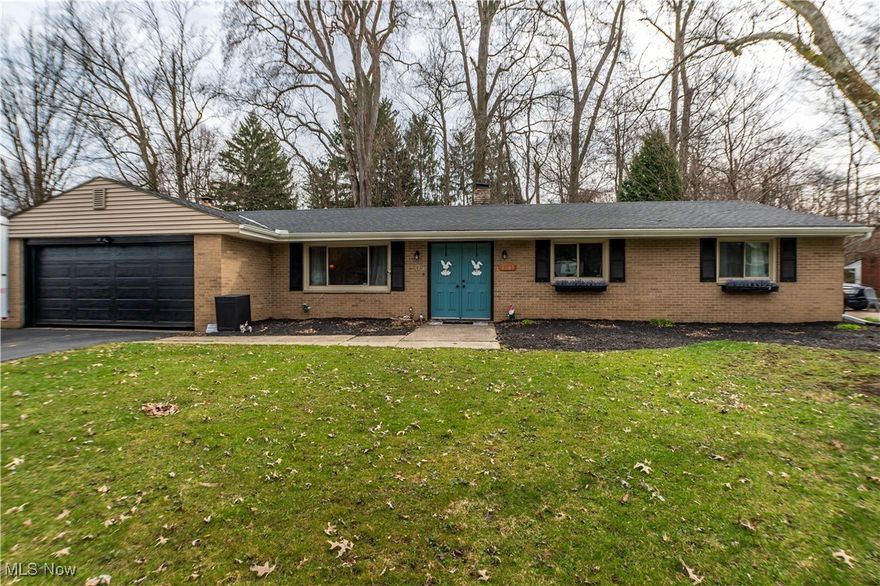 Discover the charm of this ranch style home at 8063 Rolling Brook Rd in Sagamore Hills, OH, nestled on a private lot with a treed backyard. Step inside to find a spacious interior featuring three bedrooms and two full baths. The modern living room boasts newer luxury vinyl floors, creating a welcoming space. Adjacent, the dining area opens to a well-appointed kitchen, ideal for hosting gatherings or enjoying quiet nights in. The kitchen flows effortlessly into another living area, complete with a sliding glass door that leads to the backyard, that has a tucked away path leads you to a cozy fire pit, perfect for relaxing evenings outdoors. Recent updates, including a new roof, siding, gutters, and refreshed bathrooms, ensure both comfort and peace of mind. Complete with a two-car garage, this home is move-in ready. Call Brandon today to schedule a private showing today!