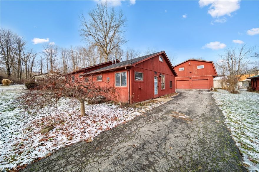 Pymatuning Lake property with access to private neighborhood docking. This home has an open floor plan with a 3 season room on the north side (back)-10 x 24 and a patio -9 x 17. Property has 200 amp service, ,full house generator, paved drive, wood burning fireplace, deck. There is a garage/barn -24 x 32- with a full second floor loft that would be perfect for storage or additional living space if finished. This property has a double lot and is within steps of Pymatuning Lake. Great opportunity for an outdoor lover or seasonal escape. Easy access to the crawl space for winterization and full walk up attic as well!!