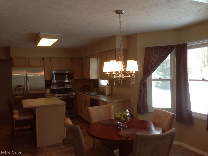 Meadowood Colonial! Welcome home! You can move right in this immaculate & well-maintained colonial with full finished basement & heated 2 car attached garage on over 1/3 acre lot! Enjoy formal dining room, eat-in kitchen with island & all appliances, great room with ceiling fan/light & fireplace, first floor laundry room, master bedroom with master bathroom & walk-in closet, 2 additional bedrooms plus finished basement with 1/2 bath & lots of storage. Flat yard provides plenty of play space & great patio for entertaining. Don't miss this 3 bedrooms, 2 full & 2 half bath home.  1 year home warranty included!