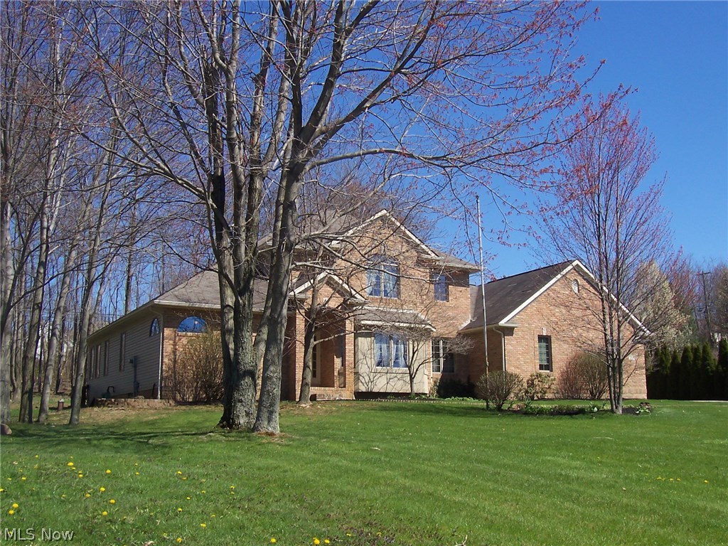 Beautiful brick front Colonial in Chenoweth Country Club Estates. New furnace and A/C in 2015. First floor Master with walk-in closet and Jacuzzi tub. Large bonus room through one of three spacious upstairs bedrooms. Cedar closet on 2nd floor. Formal dining room and large dinette. Dinette and family room share a two-sided gas fireplace. Built-in work area at one end of dinette. Huge finished rec room in basement. Reverse osmosis and central vac. Naturestone patio in back along with pond/fountain and decorative shed. First floor laundry and whole house fan. 3-car garage with built-ins and access stairs to basement. A must see; close to shopping, restaurants and highways.