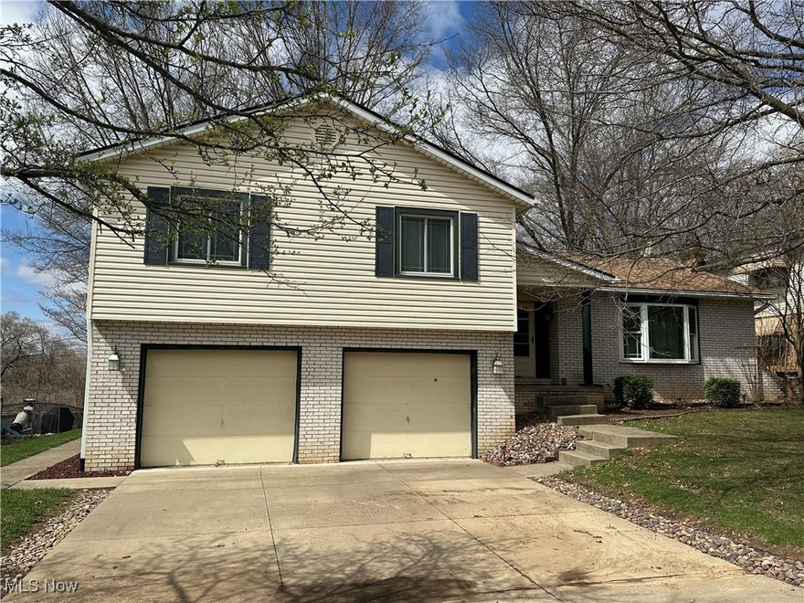 Welcome to this spacious and well-maintained 4-bedroom, 2.5-bath split-level home nestled in the desirable Veldon Estates in Plain Township. With over 2,500 sqft of living space, this home offers a thoughtful layout including a large family room with fireplace, multiple living areas, a stylish kitchen with updated flooring, and generously sized bedrooms. Situated on a nearly half-acre wooded lot on a quiet cul-de-sac, you'll love the peaceful setting, private patio, and heated garage. Located in Plain LSD with easy access to shopping and dining. Don’t miss this gem!