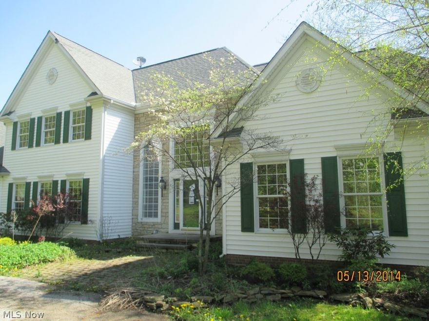 Stunning, grand home with park-like grounds!  Two story foyer and Great Room with wall of windows and fireplace to enjoy the lush landscaped and wooded lot.  Gourmet kitchen with granite countertops, stainless steel appliances and pantry. Formal dining room features both hardwood floors and crown moulding.  First floor master bedroom with glamour bath and his/her vanities.  Master bedroom features walk-in closets, vaulted ceilings and access to Sun Room.  Fully, finished walk-out basement with Rec Room, full bath and bedroom. Second level features 3 bedrooms, loft and 2 full bathrooms.  Other amenities include deck, central air and 3 car attached garage.  This is a Fannie Mae HomePath Property.