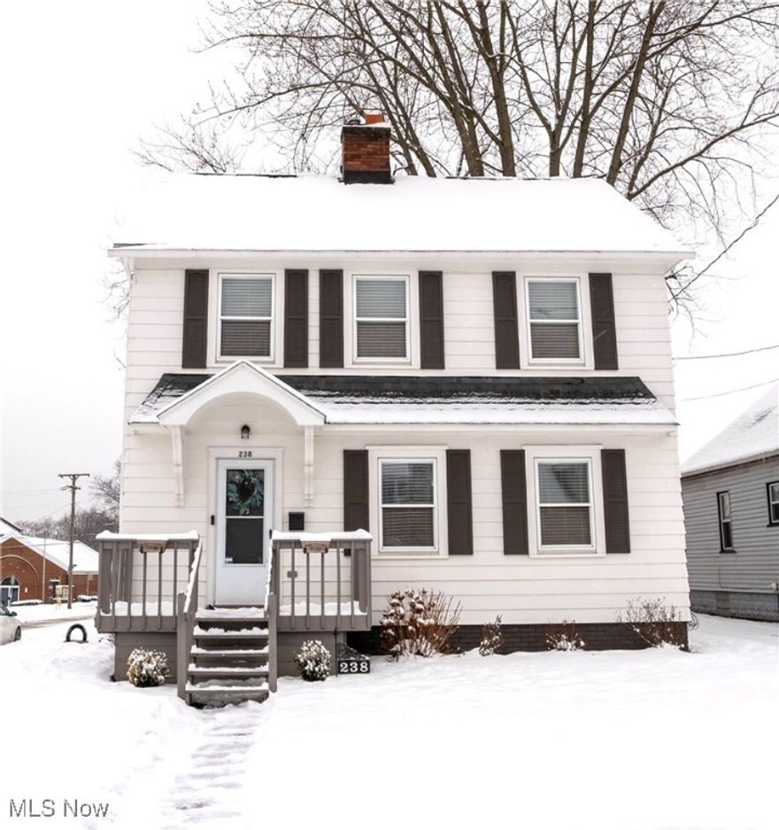 Much to love in this comfortable and tastefully updated 3 bed, 1.5 bath Colonial home. A charming property with original features like the curved archways, complemented by modern updates and opened living space. An inviting entryway welcomes you and warm wood look luxury vinyl plank floors are carried through the entire first floor. A cozy living room with built-in bookshelf, fireplace and large mantel, is perfect for relaxing or entertaining as it flows seamlessly into the dedicated dining room and expansive kitchen. Slider to the back deck and yard and windows throughout offer wonderful natural light. The first floor half bath, a rare commodity in this style and age home. Kitchen offers loads of counter space, cabinetry and stainless appliances that all transfer with the home. Head upstairs to 3 carpeted good size bedrooms and a recently remodeled full bath with new tub / shower surround. A wonderful insulated walk-up attic currently used for gaming and storage offers additional future living space. Unfinished basement with loads of storage. HVAC 2022 and detached 2-car garage. A wonderful location in Barberton, walking distance from Edgewood Park featuring a playground, splash pad and pickle ball courts! Minutes from grocery, shopping and easily access bordering cities of Norton, Wadsworth, Akron and Portage Lakes.