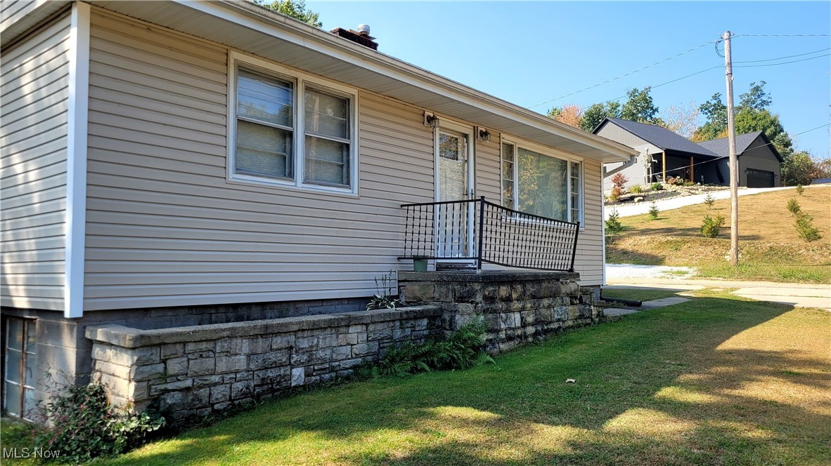 A great investment property in the scenic Brady Lake area. Ranch has nice size Living Room, eatin kitchen w/ formica counters, full bath & 3 good size bedrooms. The full bath has a tub shower & newer fixtures. Tenant believes there are hardwood floors under all the carpets. Basement has a finished family room & laundry area. Newer vinyl siding & roof. Double lot with backyard. Tenant is leaving some building materials. Quick occupancy1