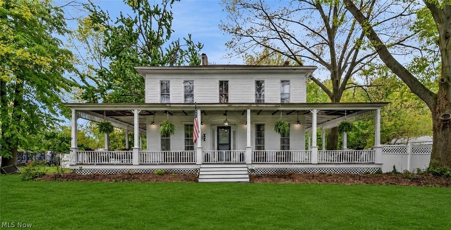 Built in 1860, this truly one-of-a-kind home perfectly blends timeless character with thoughtful modern updates. Situated on .75 acres, the property offers the most beautiful curb appeal around with a stunning wraparound front porch featuring new composite decking (2026). Enjoy your morning coffee while relaxing on your porch swing. The backyard is fully fenced with vinyl fencing (2019) creating your own private outdoor retreat complete with an in-ground pool, greenhouse, chicken coop, spacious composite deck, and an outdoor kitchen area featuring a granite counter with sink—perfect for entertaining all summer long.
Inside, you’ll find a beautifully remodeled kitchen while still maintaining the unique details and warmth that make older homes so special. The remodeled kitchen features granite countertops, a pantry, coffee bar, pot filler, and updated appliances including a new refrigerator (2025), dishwasher and stove (2019). The mudroom continues the upscale feel with additional cabinetry/storage, granite countertops and a convenient dog washing station. A thoughtfully designed addition created a spacious upstairs primary suite, while second-floor laundry with washer and dryer adds everyday convenience.
With five bedrooms, a bonus sixth room, three full bathrooms, two living spaces, and a dedicated first-floor office, this home offers incredible flexibility and room to grow. Additional major updates include two furnaces (2019), hot water tank (2020), updated electrical with new electrical box (2019), electrical subpanel in the garage, and a new garage door (2026).
From the stunning curb appeal to the endless amenities and character throughout, this exceptional property is unlike anything else on the market!