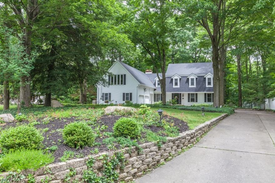 Rare Opportunity!! Over 300 Ft frontage and over 2 acres of private, picturesque wooded setting. The Hearth room with wood burning fireplace is definitely the gathering place for family and friends. 4 bedrooms plus bonus room. First floor den with built in bookcases, Large kitchen offers granite countertops and bay window. This Meticulously materialized home also offers in ground pool with pool house and its own bathroom. Pond and Large deck also. Must See to appreciate this beautiful home. HURRY!