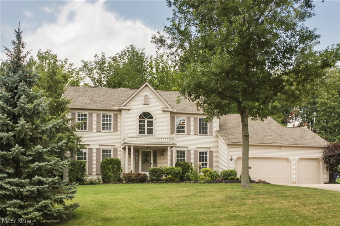 Custom built Colonial. Bayed kitchen with granite counter tops. Vaulted family room. 1st floor office. 3 full baths. Updated interior. Treed lot with above ground pool and a large deck.