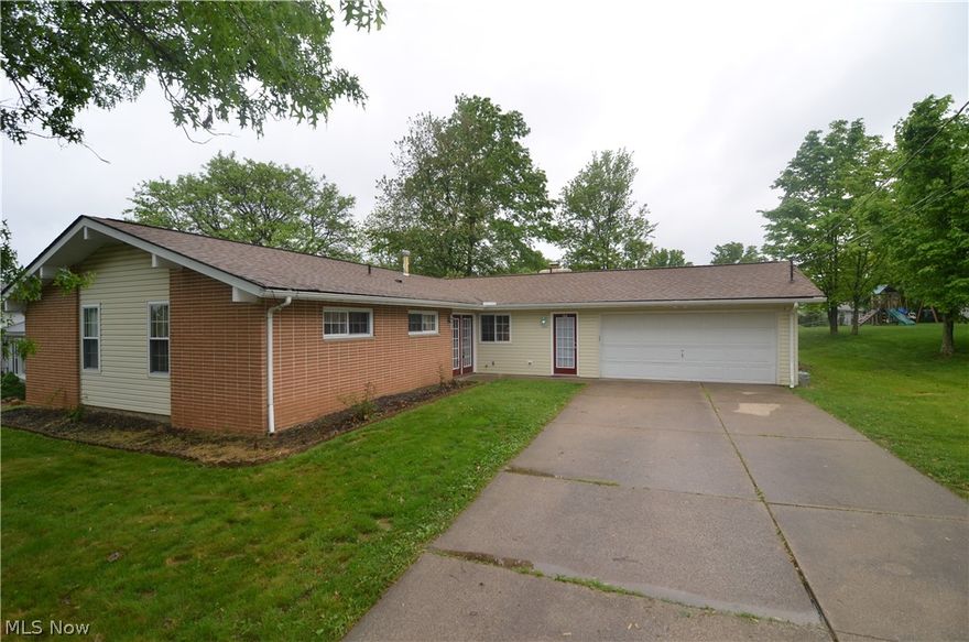 Four Seasons Lake Neighborhood features this lovely ranch that has been totally updated.  From the granite countertops to the glass block island and the stainless steel appliances this kitchen is amazing and It is open to the family room with the brick wood burning fireplace. The great room has the whole wall of windows and sliding doors to the very nice backyard and patio. Nice outbuilding with concrete floor for additional storage. The bathrooms even have granite flooring. Newer windows, doors, flooring, furnace, air conditioning, roof, insulation. This home has a security system and a smart home thermostat. The optional Four Seasons Community membership offers a swimming lake with a beach, social activities, park, playground and much more. All of this with Aurora Schools rated Excellent with Distinction. This home won't last