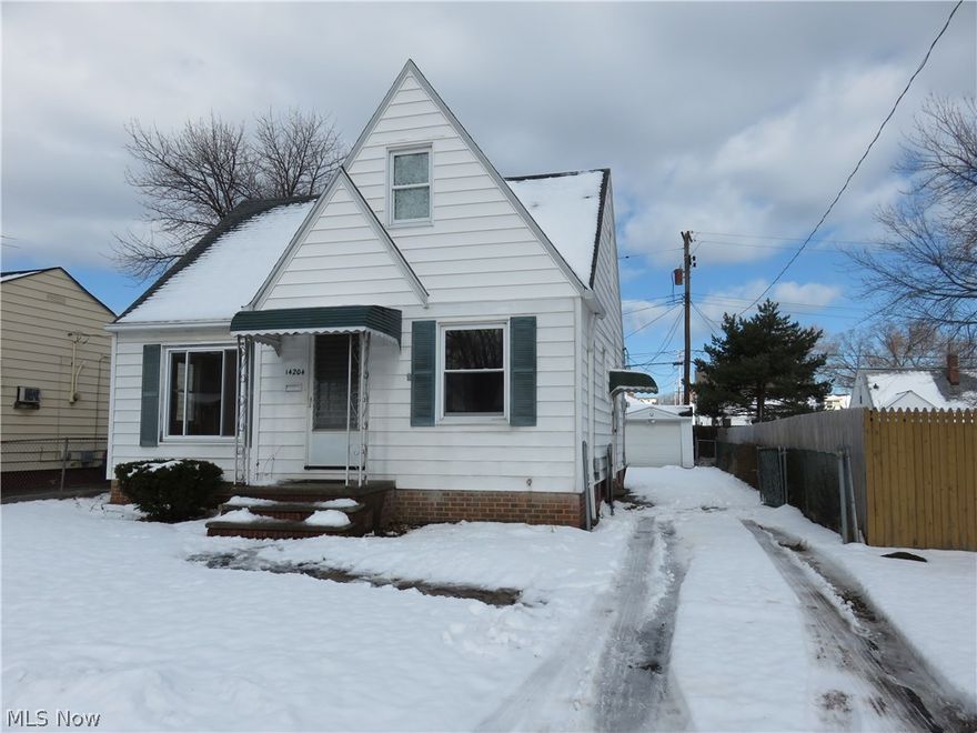 Nothing left to do but forward your mail!  Move right in this fabulous westside bungalow, freshly updated in today's colors!  Much larger than it appears, this home surprisingly offers 4 bedrooms, plus an office area, and 3 full baths!  Step inside the charming vestibule entry foyer to the bright and airy living room, with lots of natural light and gleaming hardwood floors.  Enjoy preparing meals in the inviting kitchen, boasting newer oak cabinetry, ceramic tile floors, and savor your mealtime experience in the pleasant dining space, accented with custom wall niches, great for showcasing your favorite decorative pieces.  Relax in the oversized master suite with newly added full bath, featuring a gorgeous tiled shower and stylish vanity! Large recreation room adds lots of casual entertaining / living space!  Loads of closet / storage space throughout, this beauty also features a covered patio, fenced yard, and 2-car garage!  Wonderful handy location, just minutes from highway access, s