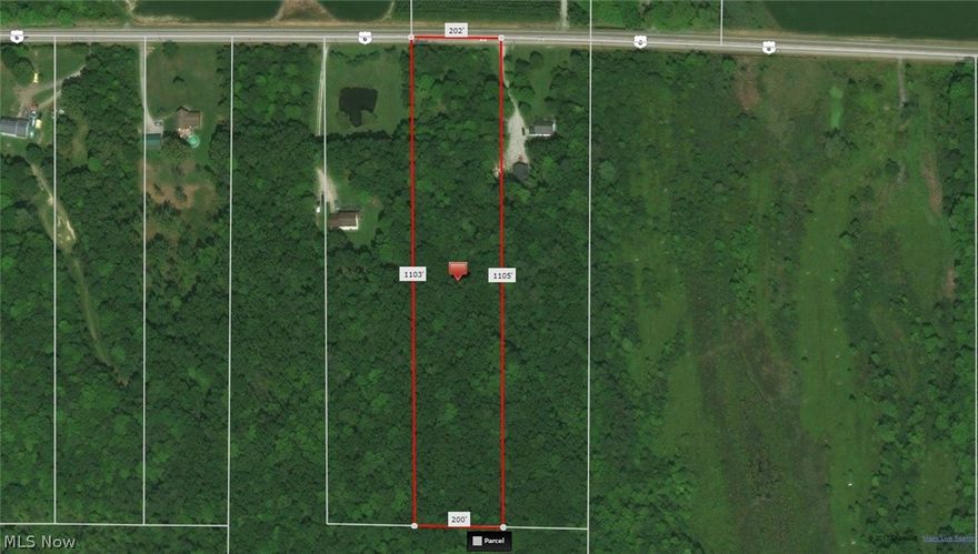 Wonderful build-able lot, already partially cleared with apple and pear trees! Located west of the Grand River and east of Hartsgrove Circle, this is the perfect country setting with easy access to the highway. Scenic, wooded, and park-like.