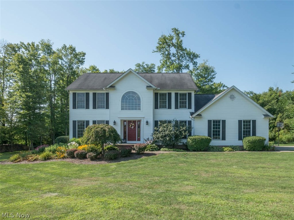 One in a million...this 2,711 sq. ft. Colonial Schumacher Home is definitely that! Nestled on 3.284 acres in United Local Schools, this elegant 3 bedroom, 2 and 1/2 bath home has it all. You will immediately be welcomed by the breathtaking foyer, complete w/wooden staircase and chandelier. The large master suite has master bath with shower, Jacuzzi bathtub, his/her vanities, and his/her walk-in closets. Plenty of space for family fun, enjoying time together in the large great room, living room, or the partially finished basement. Convenient 1st floor laundry and pantry. Large kitchen with island and two dining areas along with picturesque views from the back deck is a host and hostesses dream. 2 car garage has extra storage, so nothing will be out of place. This is it...the one you've been waiting for!
