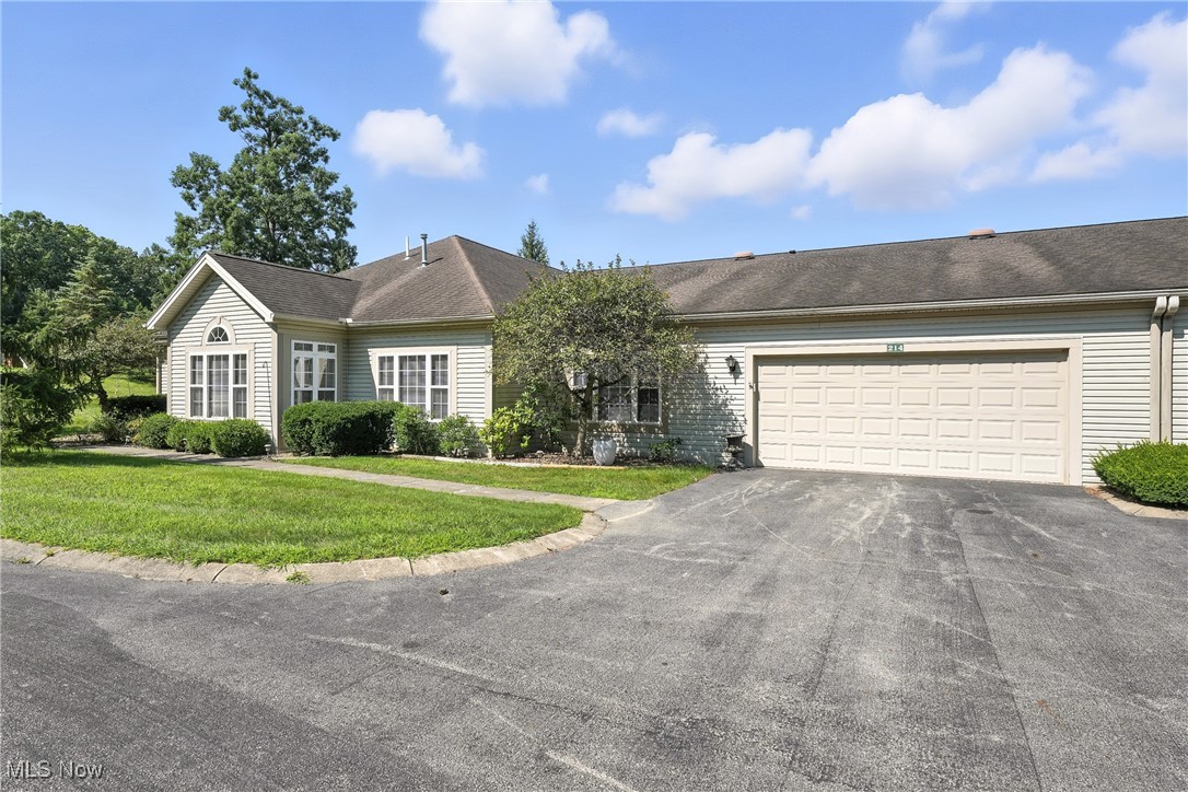 Great Austintown location for this spacious 3 bedroom, 3 bath one story condo in the gated community of Cross Creek. Great room with vaulted ceiling, fireplace and sunlit windows. Dining area features sliders to the private patio and is open to the huge kitchen highlighted by hard surface counters, breakfast bar and built-in desk area. Stainless appliances, updated LVT flooring throughout, new paint and blinds throughout. Master suite features a walk-in closet and bath with shower. Two car garage has pull down steps for additional storage space!