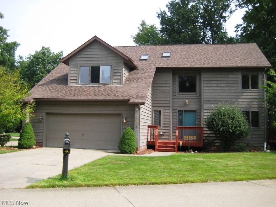 Nature lover's paradise! Welcome home to this beautiful 1st floor master retreat w/ lake view & private dock w/ fishing and boating privileges! After a long day you can now come home and relax on this great 2 level wrap around deck and enjoy a peaceful lake view! Inside you will discover an open eat-in kitchen with center island, a vaulted great room with skylights, wood beam & cozy fireplace and a private floor master suite with glamour bath, double closets & access to the deck.  The first floor also offers a convenient powder room & first floor laundry. Upstairs there is a spacious loft overlooking the great room, 2 more bedrooms & a full bath. The partially finished walk-out basement w/ half bath & wrap around deck provide many opportunities for entertaining! Quick Highway access & Close to shopping & Medina Hospital!