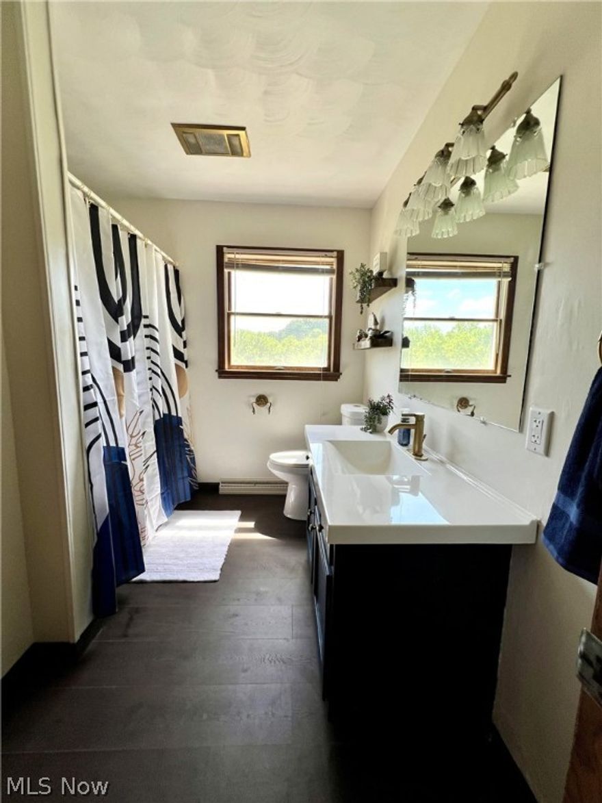 Welcome to this well-laid-out Split Level Home, with an attached 2-car garage! 3-bedroom, 2-bath home in a quiet neighborhood. This home features 2 acres and an 18 x 10 shed for additional storage space. A light and airy kitchen is great for entertaining and you can head outside through the sliding doors from the dining room to a cozy deck for even larger crowds. Both bathrooms are newly remodeled. A new a/c unit was installed, and a lot of new floor coverings throughout. This multi-level home has a ton of square footage for a large family—a convenient location outside city limits. Schedule a showing today!